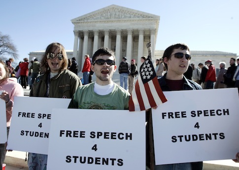 Luke Remchuk, of Bethesda, Md., left, Kevin Newcomb, of Bethesda, Md., center, and Jay Hartman, of Adelphi, Md., right, protest for students free speech outside the Supreme Court in Washington, Monday, March 19, 2007. (AP Photo/Evan Vucci)