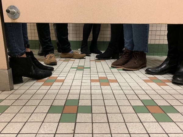 How many people can you fit in a bathroom stall?