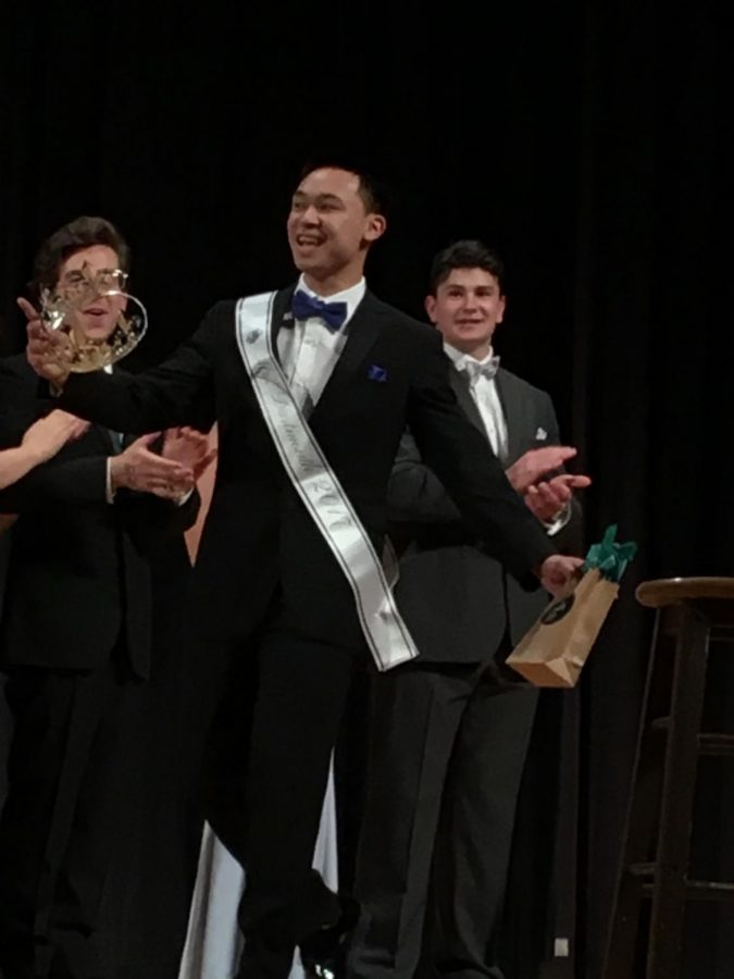 Senior Anthony Lee accepts the crown as the 2017 Mr. Dartmouth.