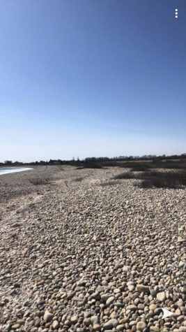 Take a walk on Round Hill Beach.
