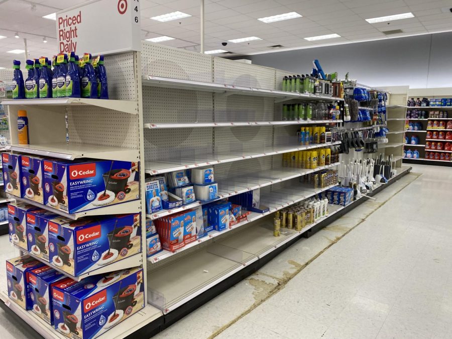 Shelves+at+Target+are+cleared+of+cleaning+supplies+and+paper+products.+