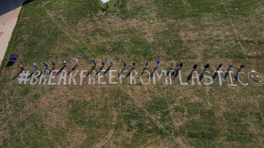 Local Climate Activists Spell Out “#BREAKFREEFROMPLASTIC” out of 32,000 Polluted Nip Bottles