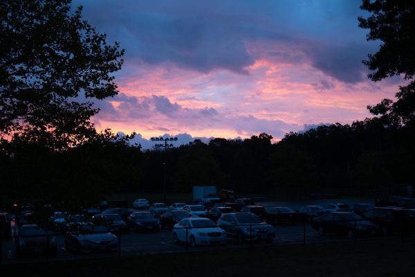The sun rises over the DHS student parking lot on Friday, September 5.