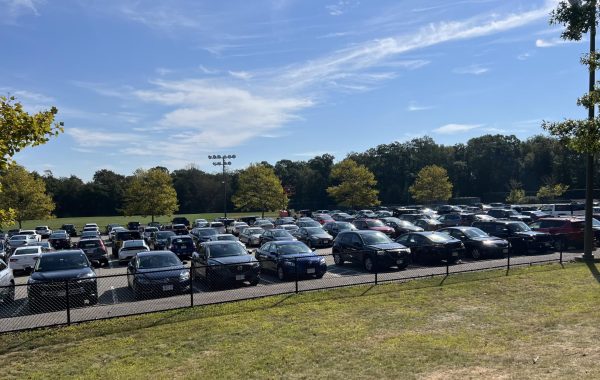 The DHS student parking lot is filled with cars during the school day.